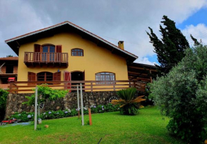 CASA AMARELA com estacionamento e Wi-Fi em Monte Verde MG - Pet friendly